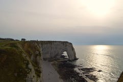 View of Normandy`s cliffs Etretat - sunset. nature, ocean, rock and sky. stock photo View of Normandy`s cliffs Etretat - sunset. nature, ocean, rock and sky. stock photo