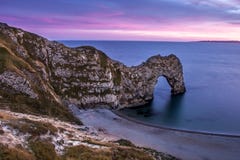 View Of Durdle Door In United Kingdom At Sunset. Royalty Free Stock Photos