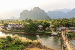 View Of Wooden Bridge Over River Song, Vang Vieng, Laos. Royalty Free Stock Image