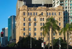 View of the old building in the CBD with modern skyscrapers behind it and palm trees in the foreground in Brisbane Queensland Aust royalty free stock images View of the old building in the CBD with modern skyscrapers behind it and palm trees in the foreground in Brisbane Queensland Aust royalty free stock images