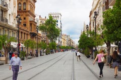 View of old street with old houses in city center of Seville royalty free stock photos View of old street with old houses in city center of Seville royalty free stock photos