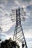 View of the power line against the clouds of blue sky in the sunlight. royalty free stock photo View of the power line against the clouds of blue sky in the sunlight. royalty free stock photo