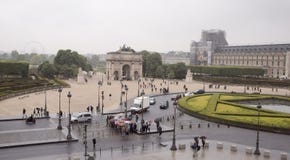 View from the second floor of the Louvre to the rainy Place du C Royalty Free Stock Images View from the second floor of the Louvre to the rainy Place du C Royalty Free Stock Images