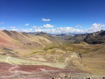 A view of the several hiking paths leading through the incredible Rainbow Mountain and surrounding Andes Mountains outside of Cusc stock photography A view of the several hiking paths leading through the incredible Rainbow Mountain and surrounding Andes Mountains outside of Cusc stock photography