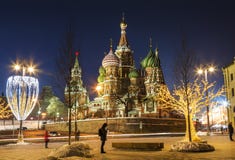 View of St. Basil`s Cathedral and the Kremlin in new year`s evening. Moscow royalty free stock photo View of St. Basil`s Cathedral and the Kremlin in new year`s evening. Moscow royalty free stock photo