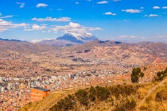 View to the snow cap of Illimani peak and valley full of living houses, El Alto, La Paz city, Bolivia stock photos View to the snow cap of Illimani peak and valley full of living houses, El Alto, La Paz city, Bolivia stock photos