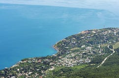 View from the top of the mountain to the seaside town stock photos View from the top of the mountain to the seaside town stock photos