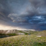 View of Tulpar Kul lake in Kyrgyzstan during the storm Stock Images View of Tulpar Kul lake in Kyrgyzstan during the storm Stock Images