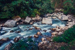 View on the Urubamba river under the Machu Picchu mountain. stock photo View on the Urubamba river under the Machu Picchu mountain. stock photo