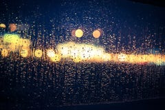 View through a window in the rain View through a window in the rain