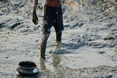 Village boy is fishing in a muddy pond stock photo stock photo Village boy is fishing in a muddy pond stock photo stock photo