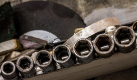 Vintage antique automotive machine shop hardened well used steel shallow impact socket set stock photo Vintage antique automotive machine shop hardened well used steel shallow impact socket set stock photo