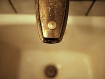 Dark Bronze Aged Metal Bath Plumbing Faucet and Drain royalty free stock images Dark Bronze Aged Metal Bath Plumbing Faucet and Drain royalty free stock images