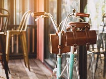 Vintage bicycle with leather bag on saddle Hipster lifestyle royalty free stock photo Vintage bicycle with leather bag on saddle Hipster lifestyle royalty free stock photo