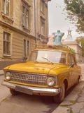 Vintage car. Classical retro car. Old style car. Vechicle concept. Mannequins on the street. stock photography Vintage car. Classical retro car. Old style car. Vechicle concept. Mannequins on the street. stock photography