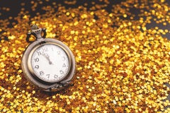Vintage clock on confetti background royalty free stock photo Vintage clock on confetti background royalty free stock photo