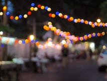 Vintage tone colorful of light abstract blur image of Night festival on street with light bokeh for background usage royalty free stock image Vintage tone colorful of light abstract blur image of Night festival on street with light bokeh for background usage royalty free stock image