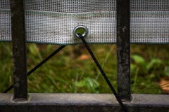 Vinyl Banner Attached To The Fence Rope Through The Metal Ring Stock Image Vinyl Banner Attached To The Fence Rope Through The Metal Ring Stock Image