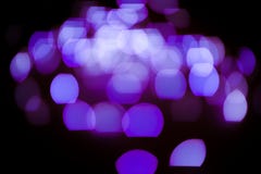 Violet glitter lights background. defocused stock image Violet glitter lights background. defocused stock image