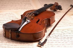Violin. E over music notes Violin. E over music notes