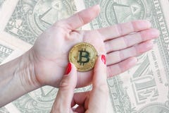 Virtual money golden bitcoin women hand with red nails fingers on white background stock photography Virtual money golden bitcoin women hand with red nails fingers on white background stock photography