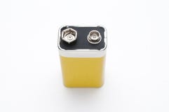 Vista superiore isolata batteria in bianco 9v immagine stock Vista superiore isolata batteria in bianco 9v immagine stock
