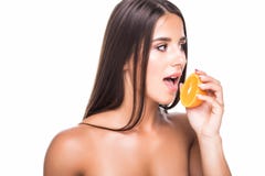 Vitality concept. Portrait of enjoyed appealing woman with citrus slices isolated on white background stock photography Vitality concept. Portrait of enjoyed appealing woman with citrus slices isolated on white background stock photography