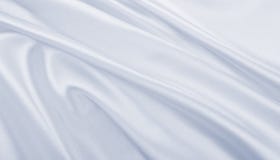 Vlotte elegante grijze zijde of satijnluxedoek als huwelijk backgr stock afbeelding Vlotte elegante grijze zijde of satijnluxedoek als huwelijk backgr stock afbeelding