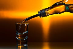 Vodka on glass table stock images Vodka on glass table stock images