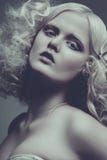 Vogue style portrait of beautiful delicate woman. drammatic colo stock photos Vogue style portrait of beautiful delicate woman. drammatic colo stock photos
