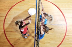 Volleyball. Game sport with group of girls indoor in sport arena Volleyball. Game sport with group of girls indoor in sport arena