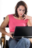 Vrouw met Laptop in Directeuren Chair Stock Foto's Vrouw met Laptop in Directeuren Chair Stock Foto's