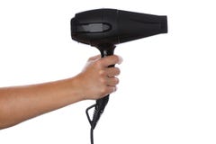 Vrouwelijke hand die zwarte hairdryer houden royalty-vrije stock fotografie Vrouwelijke hand die zwarte hairdryer houden royalty-vrije stock fotografie