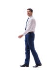Vue de côté debout de marche d'homme d'affaires d'isolement sur le backgro blanc images stock Vue de côté debout de marche d'homme d'affaires d'isolement sur le backgro blanc images stock