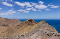 Vulkanische Landschaft von Fuerteventura lizenzfreies stockbild Vulkanische Landschaft von Fuerteventura lizenzfreies stockbild