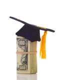 A wad of hundred dollar bills wrapped around themself with a mortarboard ontop depicting the College Admission Bribery Scandal royalty free stock photo A wad of hundred dollar bills wrapped around themself with a mortarboard ontop depicting the College Admission Bribery Scandal royalty free stock photo