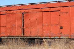 Wagon of an old rusty freight train stands on the rails royalty free stock photography Wagon of an old rusty freight train stands on the rails royalty free stock photography