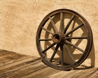 Wagon Wheel Wheel Against A Stucco Wall In Arizona Stock Image Wagon Wheel Wheel Against A Stucco Wall In Arizona Stock Image