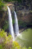 Wailua Falls, twin waterfalls flowing down in a green creek, Kauai, Hawaii, USA royalty free stock photo Wailua Falls, twin waterfalls flowing down in a green creek, Kauai, Hawaii, USA royalty free stock photo
