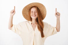 Waist-up shot of optimistic dreamy and happy girlfriend with red hair and freckles closing eyes with joyful look royalty free stock photography Waist-up shot of optimistic dreamy and happy girlfriend with red hair and freckles closing eyes with joyful look royalty free stock photography