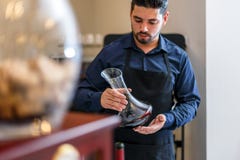 Waiter hold bottle of red wine Stock Photos Waiter hold bottle of red wine Stock Photos