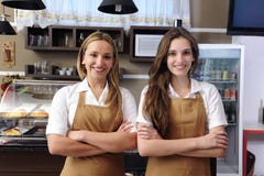 Waitresses working at a cafe