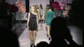Walk defile slow motion girl colorful dress catwalk model show closeup vogue 4K.