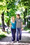 Walk In Spring Park. Man And Woman. Stock Photos