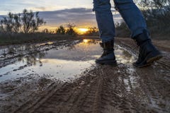 Walking through a puddle with military boots. royalty free stock photography Walking through a puddle with military boots. royalty free stock photography