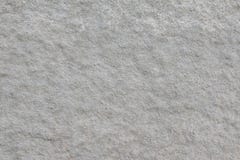 The wall covered with gray rough plaster. Background. royalty free stock image The wall covered with gray rough plaster. Background. royalty free stock image