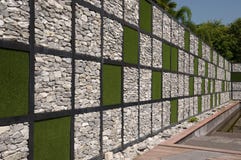 Wall Made From Rock And Artificial Grass Stock Photography