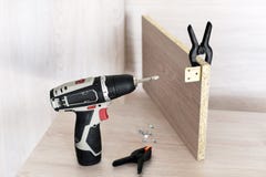 Wall Plug Dowel With Screw, Electric Power Drill, Folding Rule And Pencil On Wooden Table - Home Improvement, Repair Or Diy Stock Photography Wall Plug Dowel With Screw, Electric Power Drill, Folding Rule And Pencil On Wooden Table - Home Improvement, Repair Or Diy Stock Photography