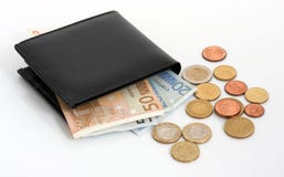 Wallet And Currencies Royalty Free Stock Photo