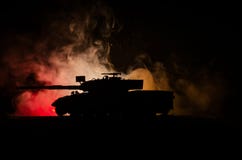 War Concept. Military Silhouettes Fighting Scene On War Fog Sky Background, German Tank In Action Below Cloudy Skyline At Night. A Stock Images War Concept. Military Silhouettes Fighting Scene On War Fog Sky Background, German Tank In Action Below Cloudy Skyline At Night. A Stock Images